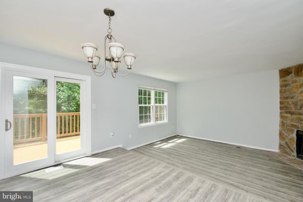 Chandelier, Empty room, Fireplace, Interior, Stone Walls, Wood Texture Flooring