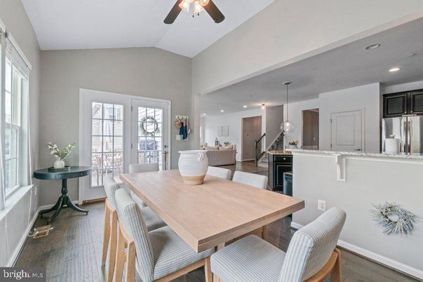 Dining room, Interior, Kitchen, Pendant Lights, Recessed Lighting, Stainless Steel Appliances, Wood Texture Flooring
