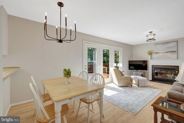 Chandelier, Dining room, Fireplace, Interior, Living room, Pendant Lights, Wood Texture Flooring