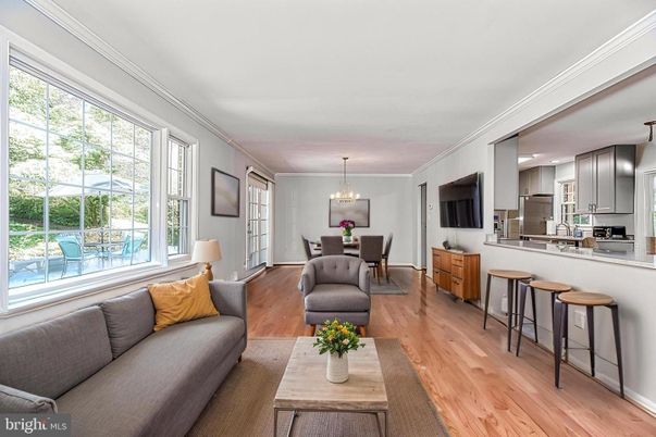 Chandelier, Dining room, Interior, Kitchen, Living room, Pendant Lights, Stainless Steel Appliances, Wood Texture Flooring