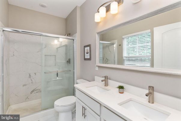 Bathroom, Dual Sink Vanities, Glass Shower, Interior, Marble Walls
