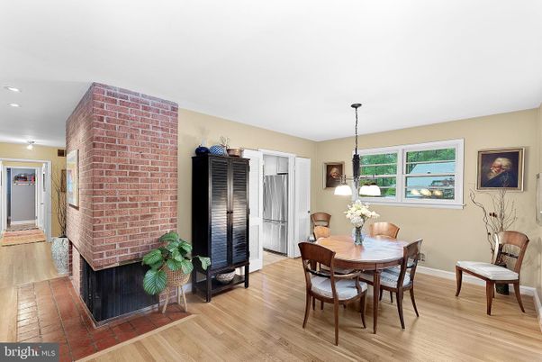 Dining room, Fireplace, Interior, Pendant Lights, Recessed Lighting, Stone Walls, Wood Texture Flooring
