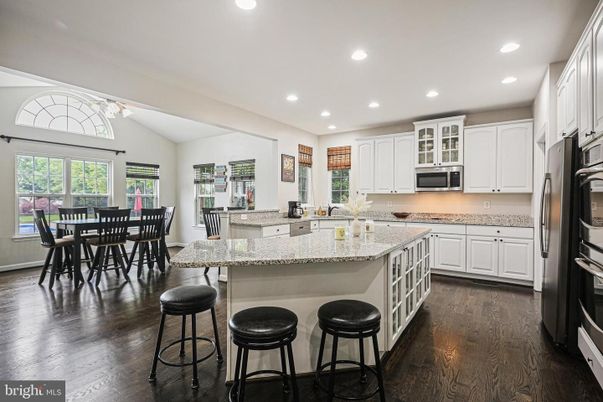 Dining room, Interior, Kitchen, Recessed Lighting, Stainless Steel Appliances, Wood Texture Flooring