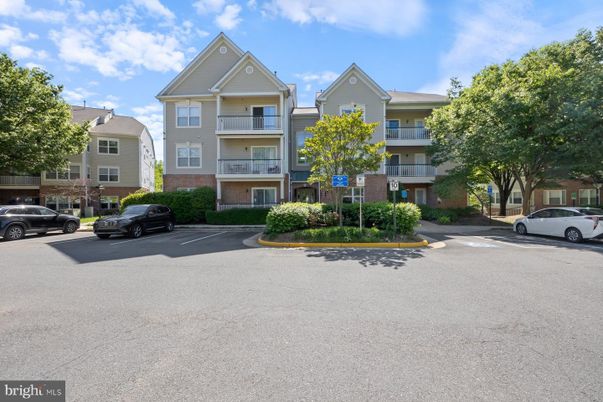Exterior, Facade, Brick Facade, Condo Building