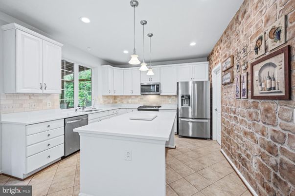 Interior, Kitchen, Pendant Lights, Recessed Lighting, Stainless Steel Appliances, Stone Walls