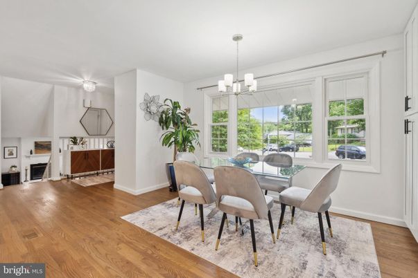 Chandelier, Dining room, Fireplace, Interior, Wood Texture Flooring