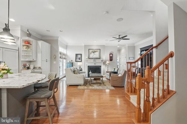 Dining room, Fireplace, Interior, Living room, Recessed Lighting, Wood Texture Flooring