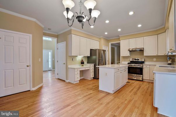 Chandelier, Interior, Kitchen, Recessed Lighting, Stainless Steel Appliances, Wood Texture Flooring