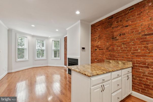 Fireplace, Interior, Recessed Lighting, Stone Walls, Wood Texture Flooring