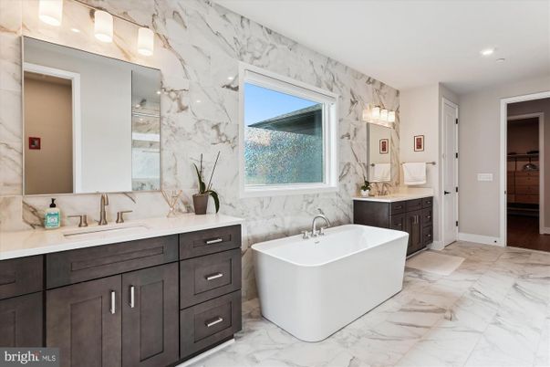 Bathroom, Dual Sink Vanities, Free Standing Baths, Interior, Marble, Marble Walls, Recessed Lighting