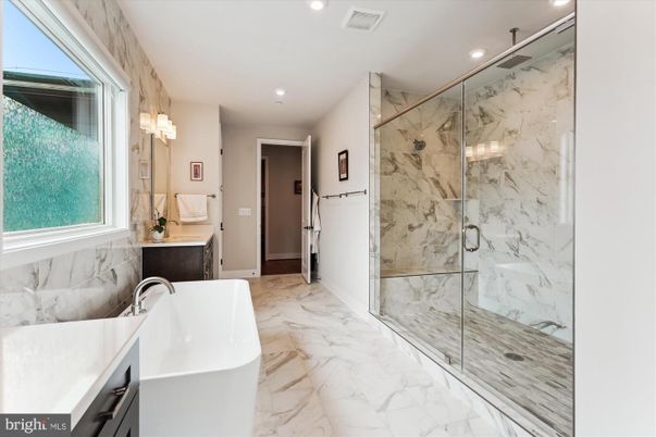 Bathroom, Free Standing Baths, Glass Shower, Interior, Marble, Marble Walls, Recessed Lighting