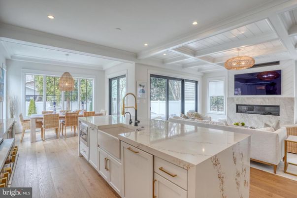 Chandelier, Dining room, Fireplace, Interior, Kitchen, Living room, Recessed Lighting, Wood Texture Flooring