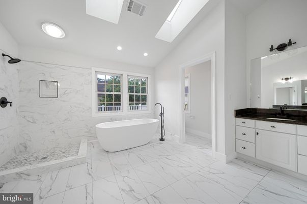 Bathroom, Free Standing Baths, Glass Shower, Interior, Marble, Marble Walls, Recessed Lighting