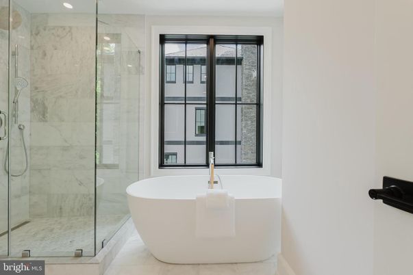 Bathroom, Free Standing Baths, Glass Shower, Interior, Marble, Marble Walls, Recessed Lighting