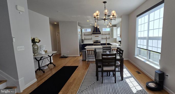 Dining room, Interior, Kitchen, Pendant Lights, Recessed Lighting, Stainless Steel Appliances, Wood Texture Flooring