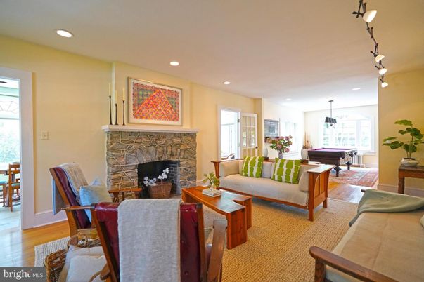 Billiard Table, Fireplace, Game Room, Interior, Living room, Pendant Lights, Recessed Lighting, Wood Texture Flooring