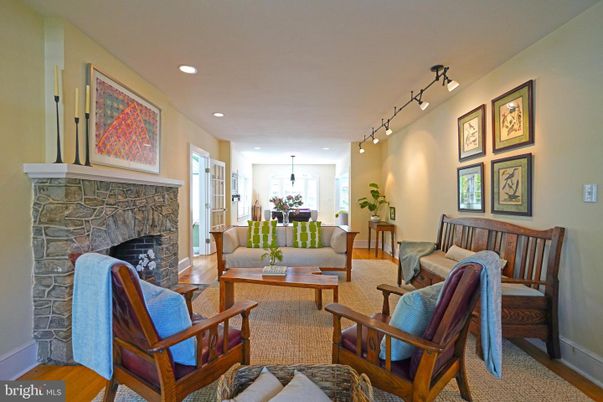 Dining room, Fireplace, Interior, Living room, Recessed Lighting, Wood Texture Flooring
