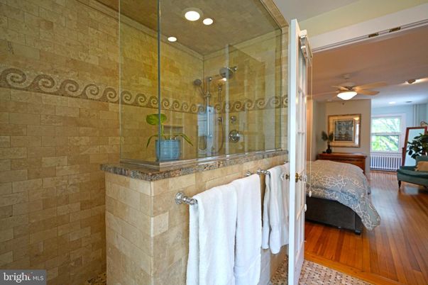 Bathroom, Bedroom, Glass Shower, Interior, Recessed Lighting, Stone Walls, Wood Texture Flooring