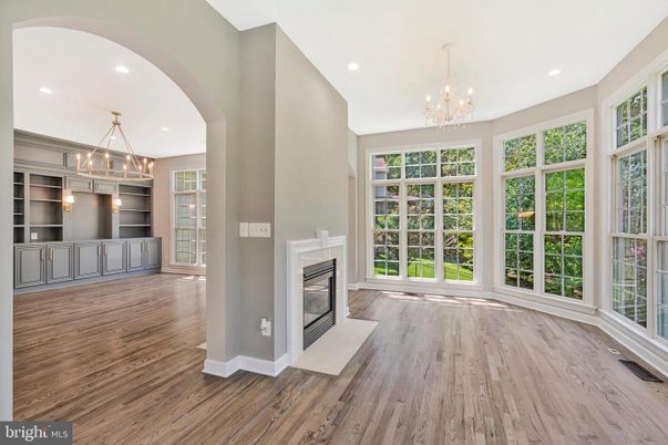Chandelier, Empty room, Fireplace, Interior, Pendant Lights, Recessed Lighting, Wood Texture Flooring