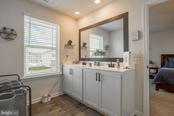 Bathroom, Dual Sink Vanities, Interior, Recessed Lighting, Wood Texture Flooring