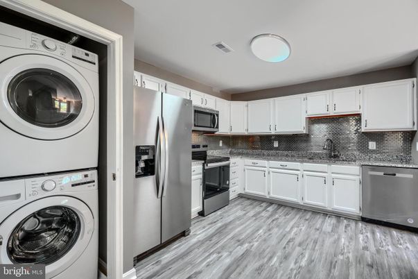Interior, Kitchen, Stainless Steel Appliances, Washer, Wood Texture Flooring
