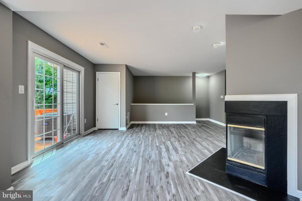 Empty room, Fireplace, Interior, Recessed Lighting, Wood Texture Flooring