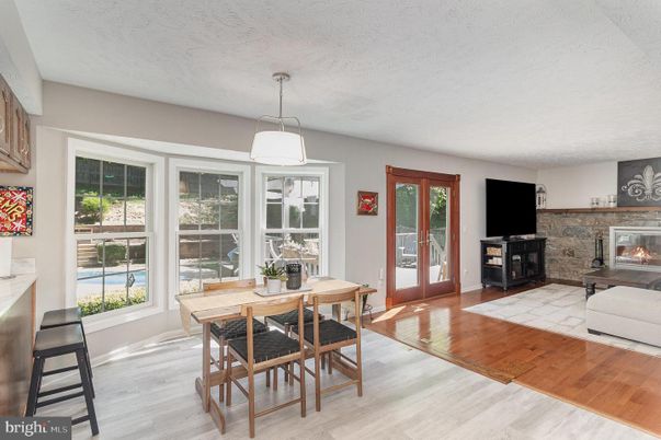 Dining room, Fireplace, Interior, Pendant Lights, Wood Texture Flooring
