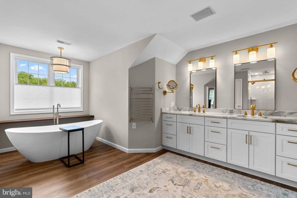 Bathroom, Dual Sink Vanities, Free Standing Baths, Interior, Pendant Lights, Wood Texture Flooring