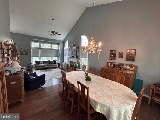 Chandelier, Dining room, Fireplace, Interior, Living room, Pendant Lights, Wood Texture Flooring