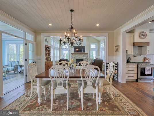 Chandelier, Dining room, Fireplace, Interior, Kitchen, Recessed Lighting, Wood Texture Flooring