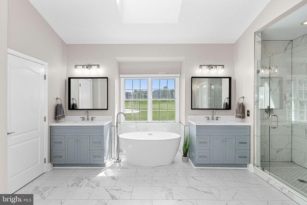 Bathroom, Dual Sink Vanities, Free Standing Baths, Glass Shower, Interior, Marble, Marble Walls, Recessed Lighting