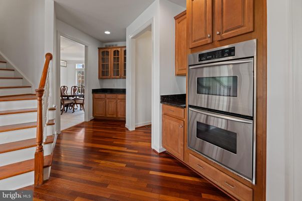 Dining room, Interior, Kitchen, Recessed Lighting, Stainless Steel Appliances, Wood Texture Flooring