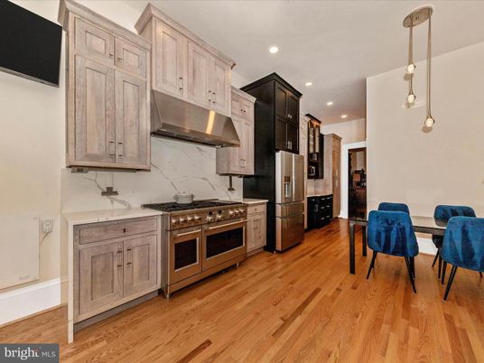 Dining room, Interior, Kitchen, Pendant Lights, Recessed Lighting, Stainless Steel Appliances, Wood Texture Flooring
