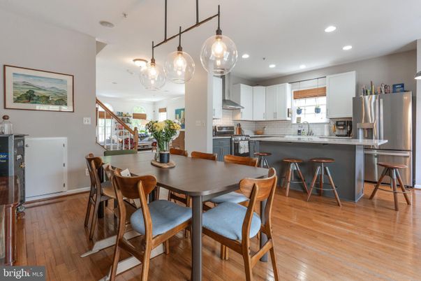 Dining room, Interior, Kitchen, Pendant Lights, Recessed Lighting, Stainless Steel Appliances, Wood Texture Flooring