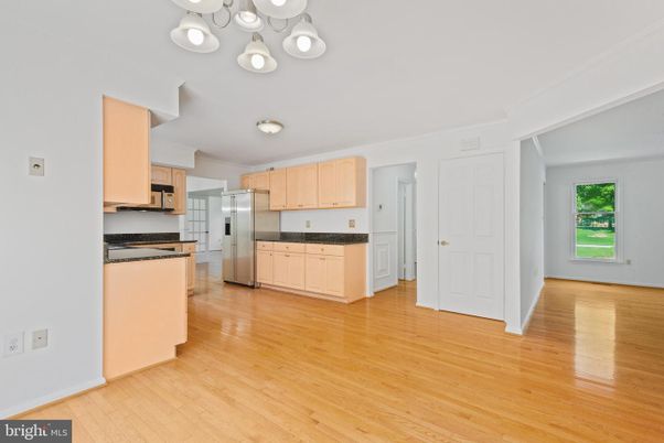 Empty room, Interior, Kitchen, Stainless Steel Appliances, Wood Texture Flooring