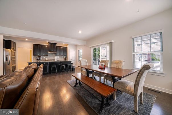 Dining room, Interior, Kitchen, Recessed Lighting, Stainless Steel Appliances, Wood Texture Flooring