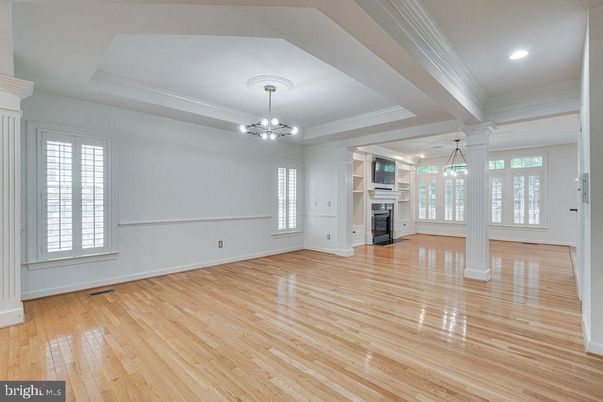 Empty room, Fireplace, Interior, Pendant Lights, Recessed Lighting, Wood Texture Flooring