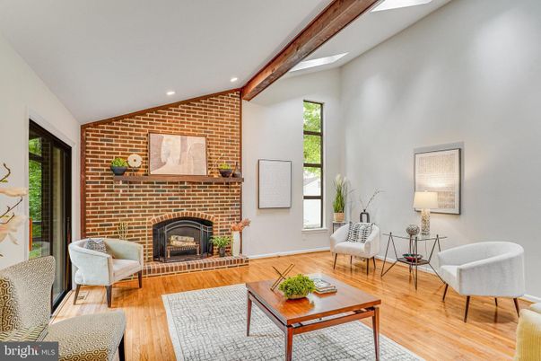 Fireplace, Interior, Living room, Recessed Lighting, Stone Walls, Wooden Beams, Wood Texture Flooring