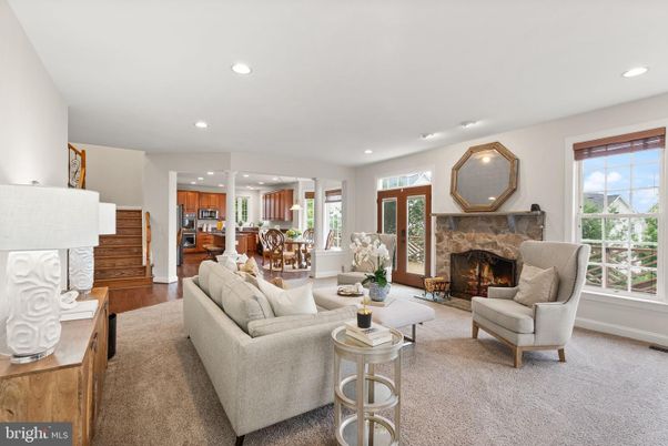 Dining room, Fireplace, Interior, Living room, Recessed Lighting, Wood Texture Flooring