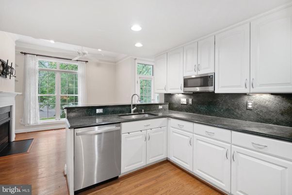 Fireplace, Interior, Kitchen, Recessed Lighting, Wood Texture Flooring