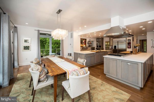 Chandelier, Dining room, Interior, Kitchen, Pendant Lights, Recessed Lighting, Stainless Steel Appliances, Wood Texture Flooring