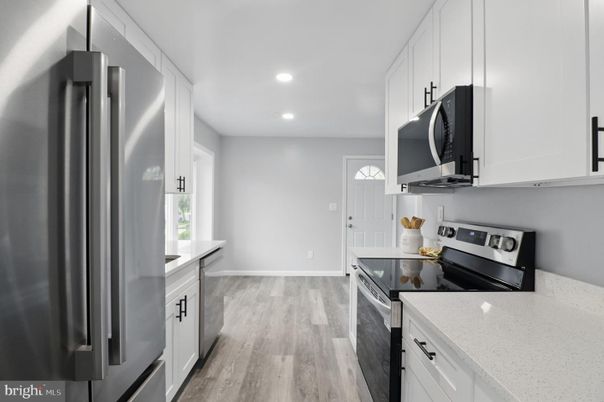 Interior, Kitchen, Recessed Lighting, Stainless Steel Appliances, Wood Texture Flooring