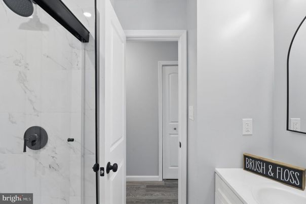Bathroom, Interior, Marble Walls, Recessed Lighting, Wood Texture Flooring