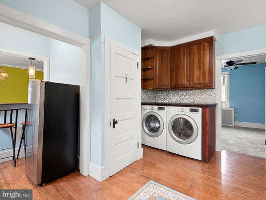 Interior, Kitchen, Pendant Lights, Washer, Wood Texture Flooring