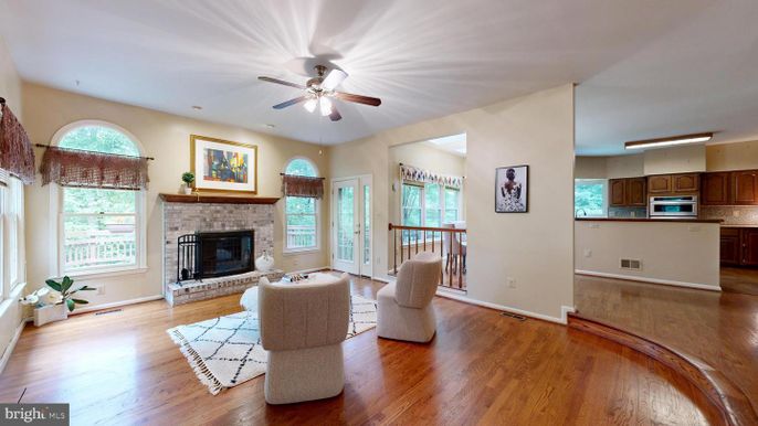 Fireplace, Interior, Kitchen, Recessed Lighting, Stainless Steel Appliances, Wood Texture Flooring