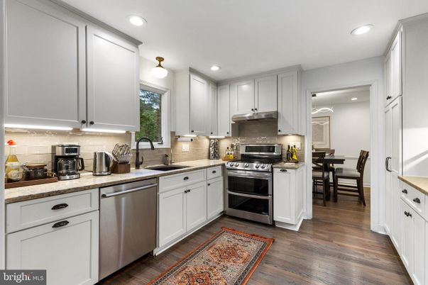 Dining room, Interior, Kitchen, Recessed Lighting, Stainless Steel Appliances, Wood Texture Flooring