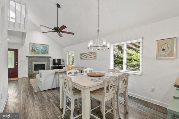 Dining room, Fireplace, Interior, Living room, Pendant Lights, Wood Texture Flooring