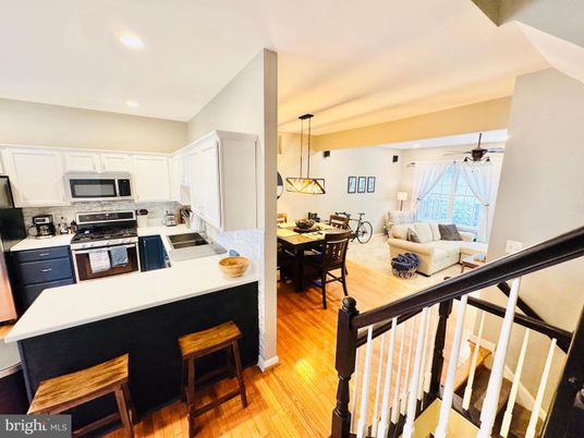 Dining room, Interior, Kitchen, Living room, Pendant Lights, Recessed Lighting, Stainless Steel Appliances, Wood Texture Flooring