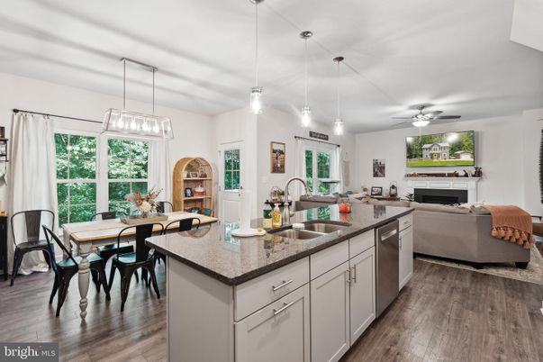 Dining room, Fireplace, Interior, Kitchen, Living room, Pendant Lights, Wood Texture Flooring