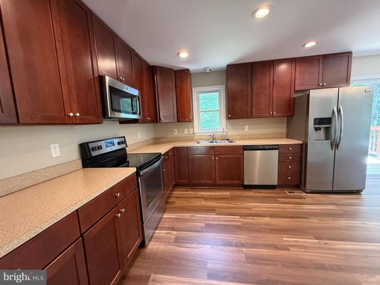 Interior, Kitchen, Recessed Lighting, Stainless Steel Appliances, Wood Texture Flooring